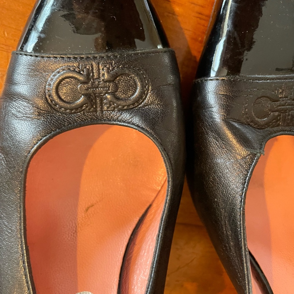 Black Ferragamo high heels lovingly worn